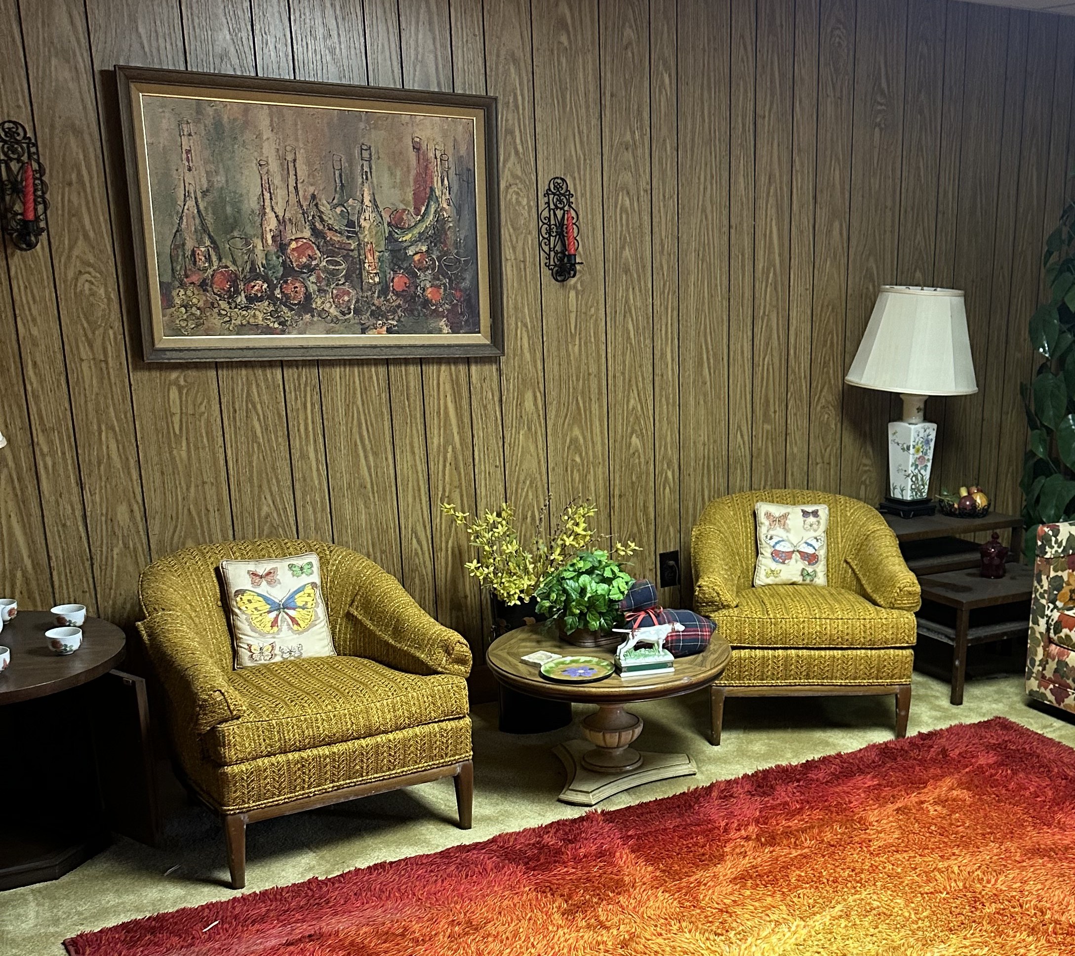 Pair of vintage Flair Inc mustard yellow tweed lounge chairs in a staged Sandy Springs room